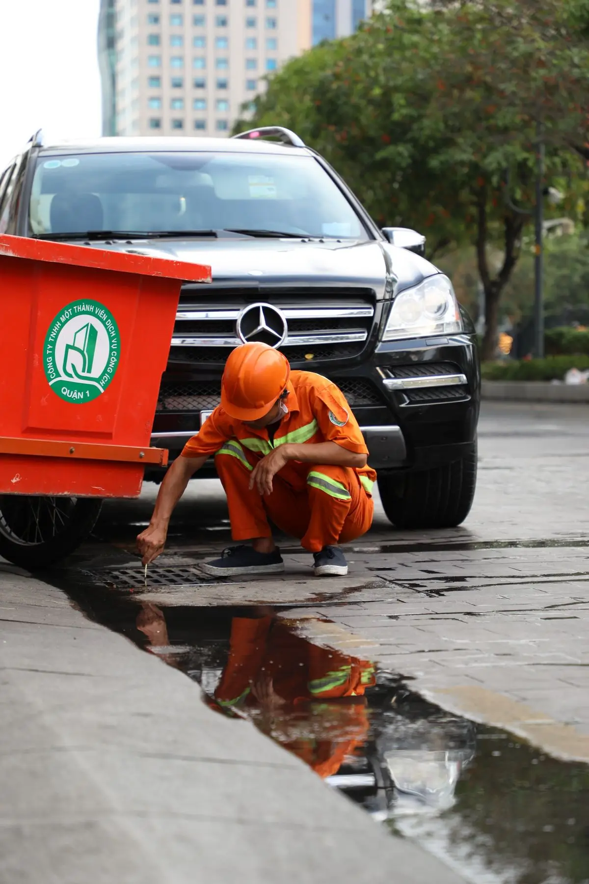 Plumber working on a street service line